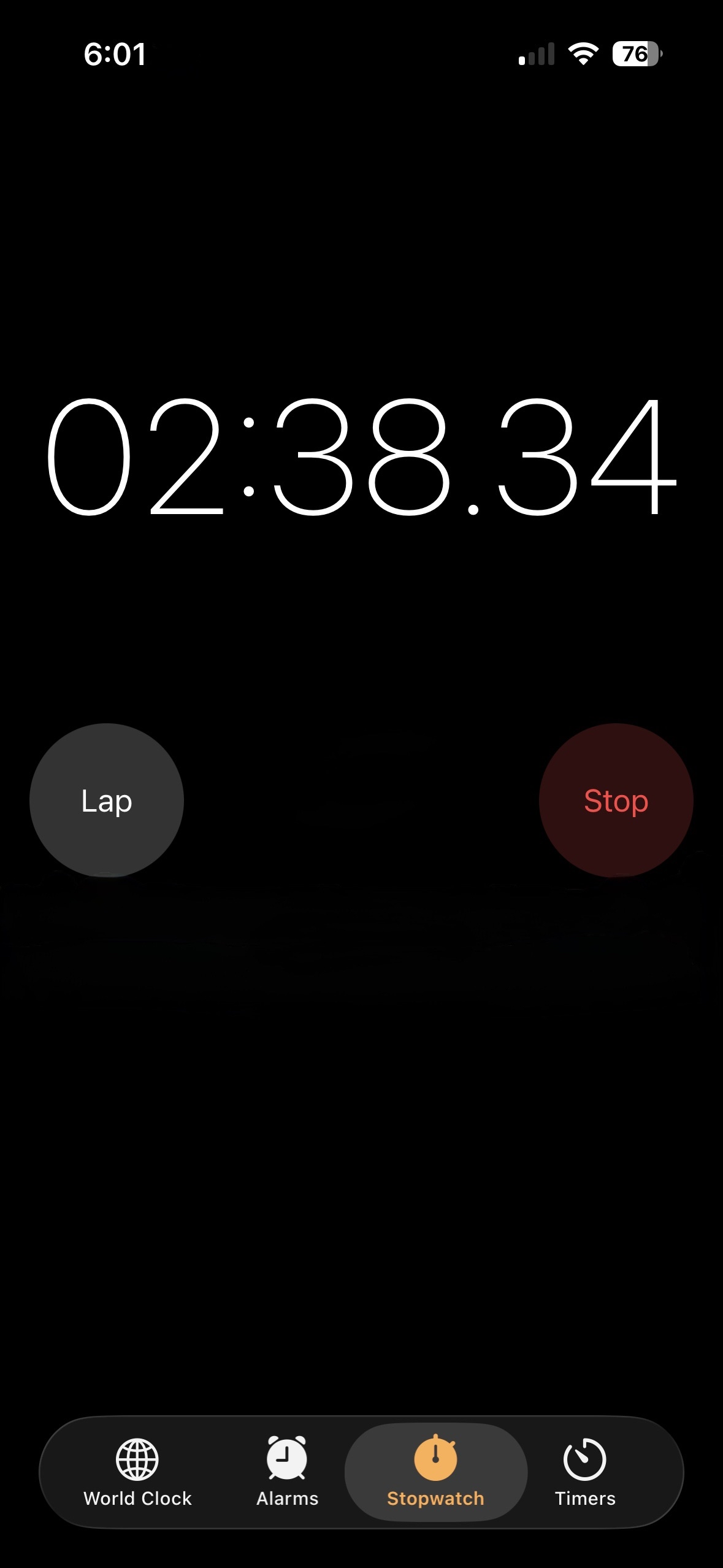 The iPhone Stopwatch app running mid-set at 2:38, the clock app you swipe over to between sets.